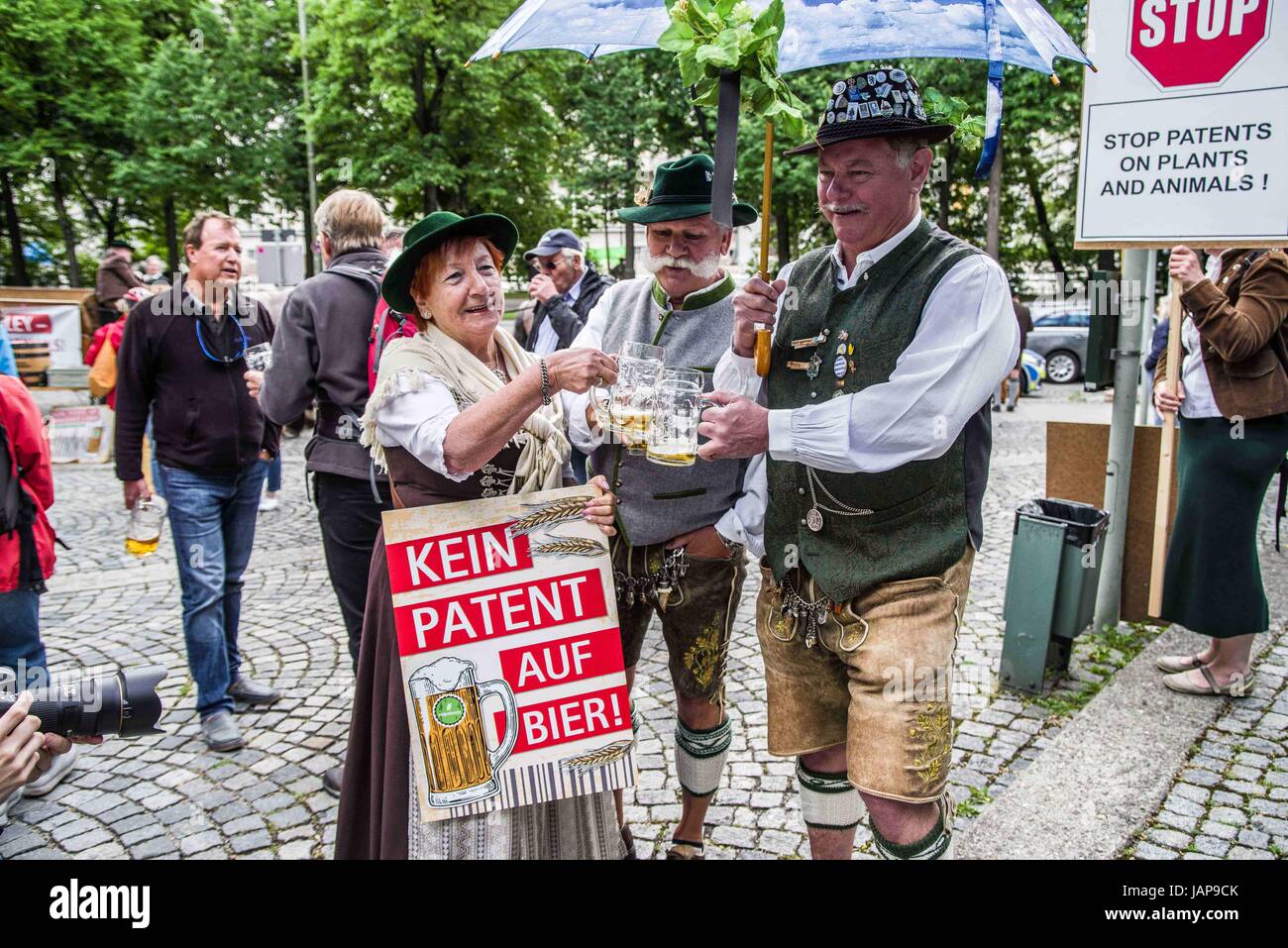 Munich. 7th June, 2017. Approximately 40 protestors assembled at the European Patent Office in Munich, Germany, in order to protest against further patenting of grains used in beer production. In 2016, Carlsberg and Heineken had both secured such patents. The demonstration was organized by the "Buendnisse Keine Patente auf Saatgut"", who alleges that those who obtain patents on living materials would not only have control of genetically-modified stocks, but also over naturally-produced and selected materials. They furthermore allege misuse of the patent system.Several representatives wen Stock Photo