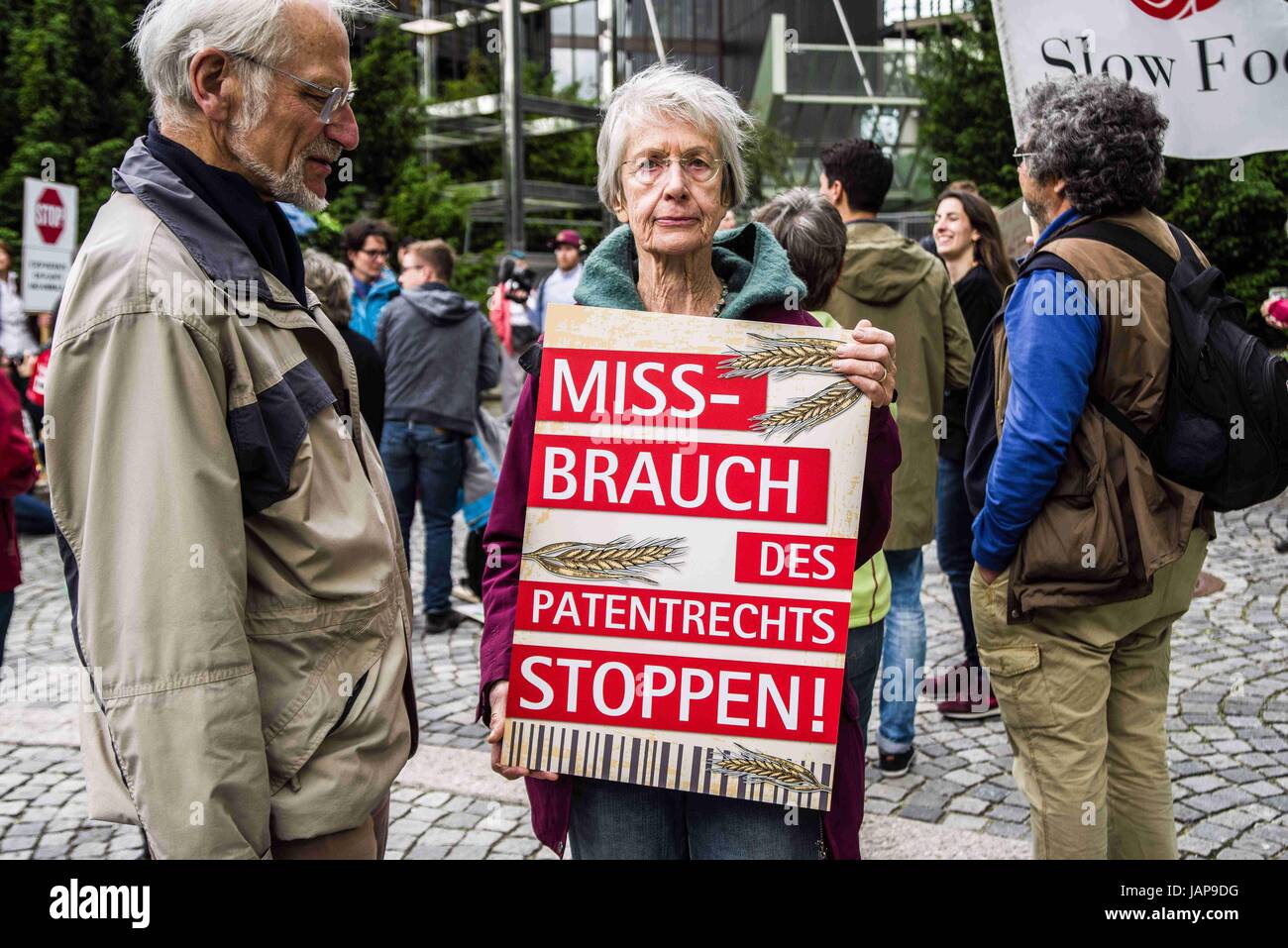 Munich. 7th June, 2017. Approximately 40 protestors assembled at the European Patent Office in Munich, Germany, in order to protest against further patenting of grains used in beer production. In 2016, Carlsberg and Heineken had both secured such patents. The demonstration was organized by the 'Buendnisse Keine Patente auf Saatgut'', who alleges that those who obtain patents on living materials would not only have control of genetically-modified stocks, but also over naturally-produced and selected materials. They furthermore allege misuse of the patent system.Several representatives wen Stock Photo