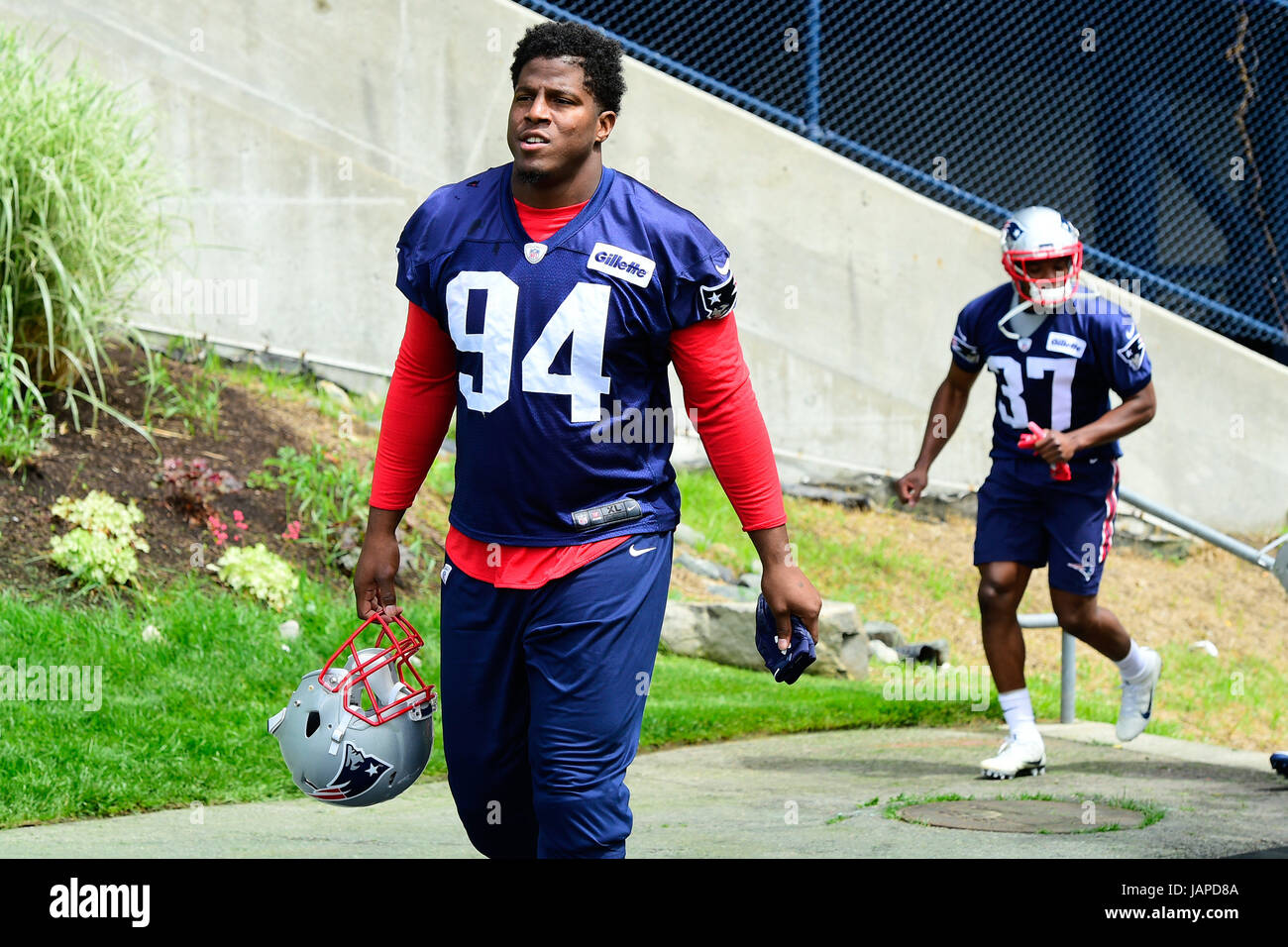 Foxborough, Massachusetts, USA. 7th June, 2017. New England Patriots defensive end Kony Ealy (94) walks to practice at the New England Patriots mini camp held on the practice field at Gillette Stadium, in Foxborough, Massachusetts. Eric Canha/CSM/Alamy Live News Stock Photo