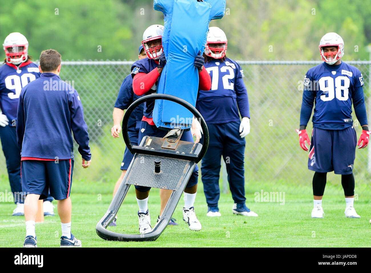 Foxborough, Massachusetts, USA. 7th June, 2017. New England Patriots defensive end Kony Ealy (94) works with a tackle dummy at the New England Patriots mini camp held on the practice field at Gillette Stadium, in Foxborough, Massachusetts. Eric Canha/CSM/Alamy Live News Stock Photo