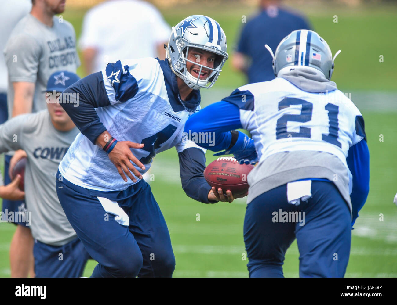 June 06, 2017: Dallas Cowboys quarterback Dak Prescott #4 hands the ...