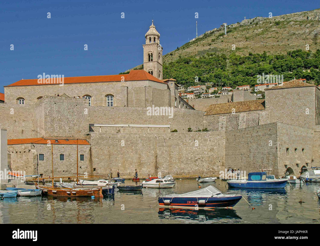 October 5, 2004 - Dubrovnik, Dubrovnik-Neretva County, Croatia - The Asimov Tower of the Dominican Monastery rises above the Old Port (Stari Porto) of the historic Old Town of Dubrovnik, encircled with massive medieval stonewalls. On the Adriatic Sea in southern Croatia, it is a UNESCO World Heritage Site and a top tourist destination. Credit: Arnold Drapkin/ZUMA Wire/Alamy Live News Stock Photo