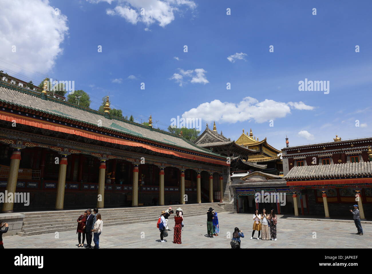 Xining, Xining, China. 7th June, 2017. Xining, CHINA-June 7 2017: (EDITORIAL USE ONLY. CHINA OUT) .The Tar Monastery, one of the six most important monasteries of the Gelukpa (Yellow Hat) school of Tibetan Buddhism, is a large complex featuring dozens of halls and towers on a mountainside in both Tibetan and Han architectural styles. Located in Huangzhong County, 25 kilometers from Xining, northwest China's Qinghai Province, the monastery was built in 1560 in honor of the founder of Gelukpa School, Tsongkhapa. It's known for its many butter sculptures, mural paintings and barbolas which fully Stock Photo