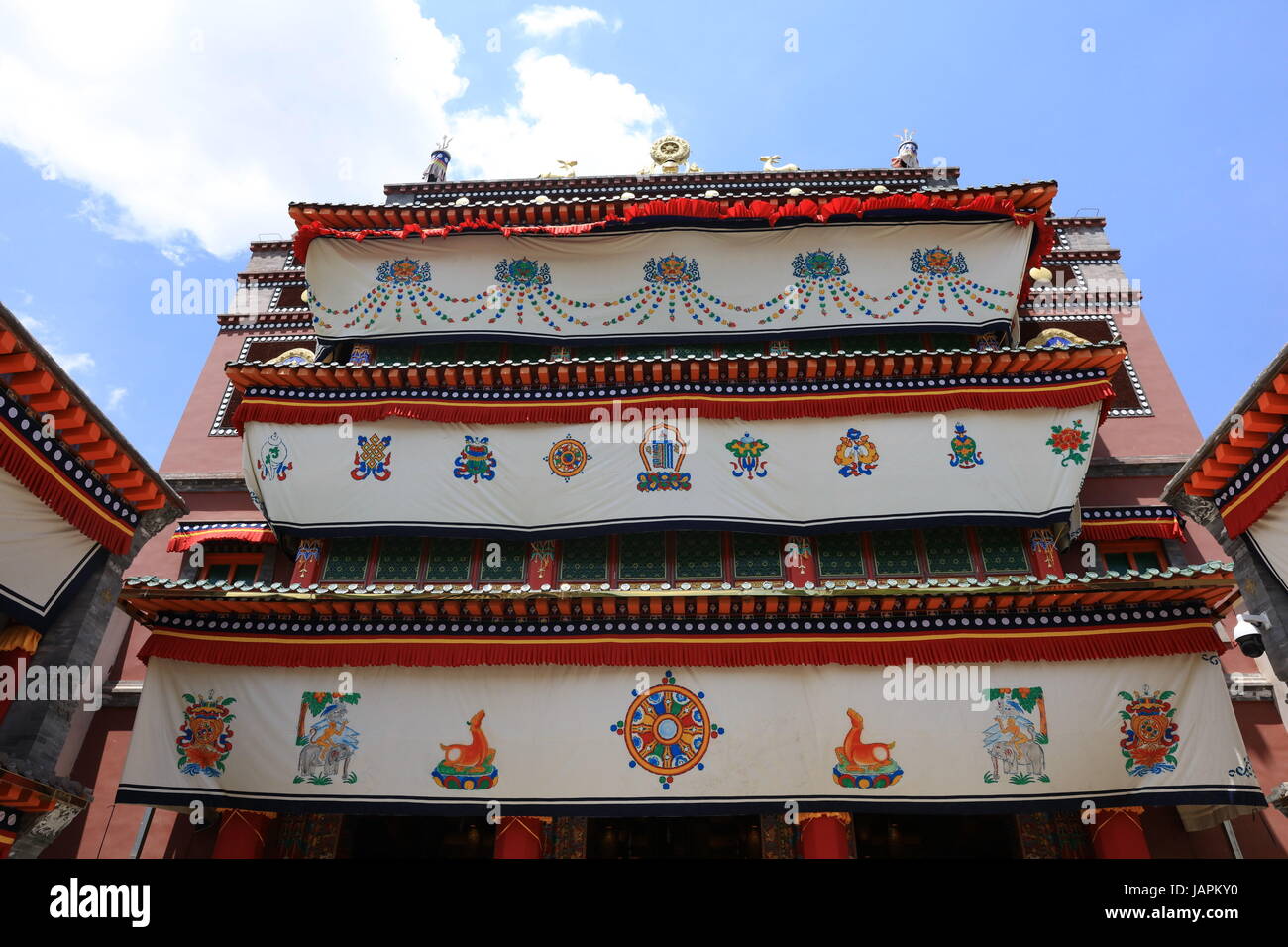 June 7, 2017 - Xining, Xining, China - Xining, CHINA-June 7 2017: (EDITORIAL USE ONLY. CHINA OUT) ..The Tar Monastery, one of the six most important monasteries of the Gelukpa (Yellow Hat) school of Tibetan Buddhism, is a large complex featuring dozens of halls and towers on a mountainside in both Tibetan and Han architectural styles. Located in Huangzhong County, 25 kilometers from Xining, northwest China's Qinghai Province, the monastery was built in 1560 in honor of the founder of Gelukpa School, Tsongkhapa. It's known for its many butter sculptures, mural paintings and barbolas which fully Stock Photo