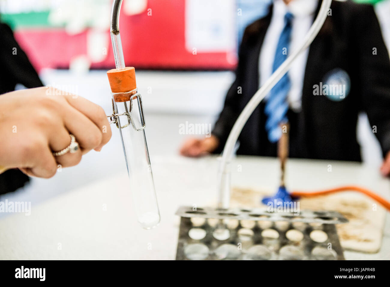 girls in chemistry lesson Stock Photo