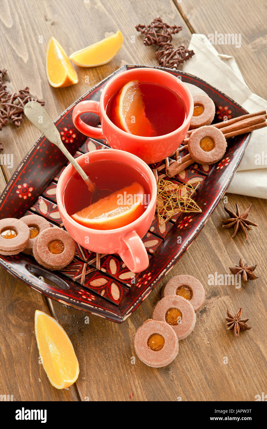 Heisser Tee / Gluehwein und Plaetzchen zur Weihnachtszeit Stock Photo ...
