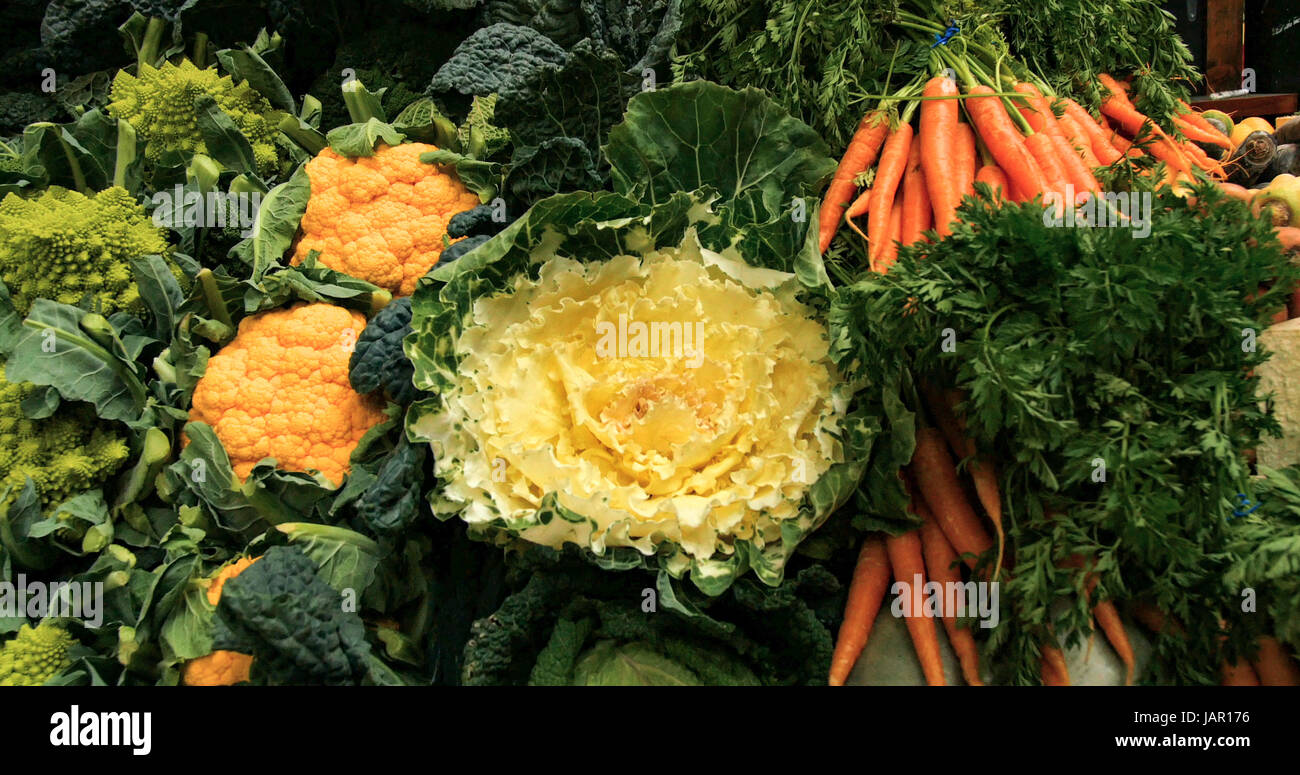 Display of different varieties of winter vegetables at a food market