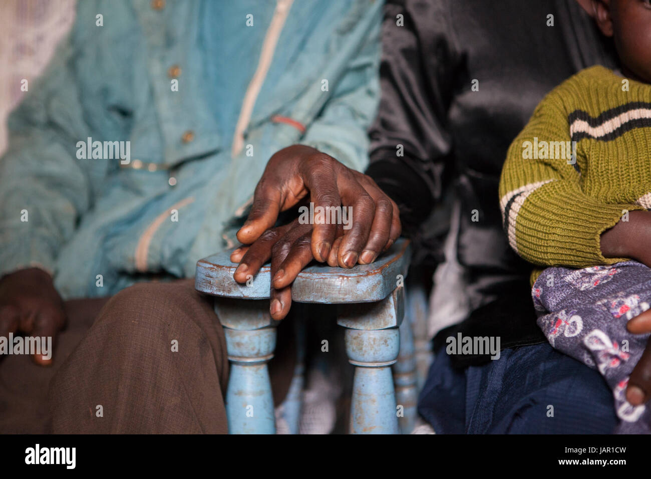 Two people holding hands, Kenya, Africa Stock Photo - Alamy