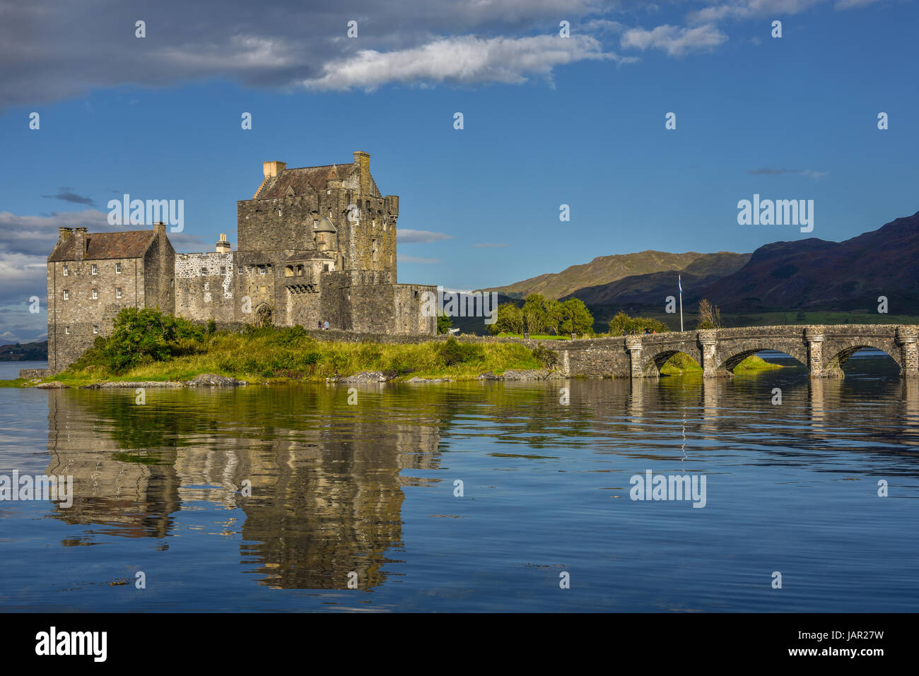 Famous Eilean Donan castle with ancient bridge. Kyle of Lochalsh, Highlands, Scotland, United Famous Eilean Donan castle with ancient bridge. Kyle of Lochalsh, Highlands, Scotland, United