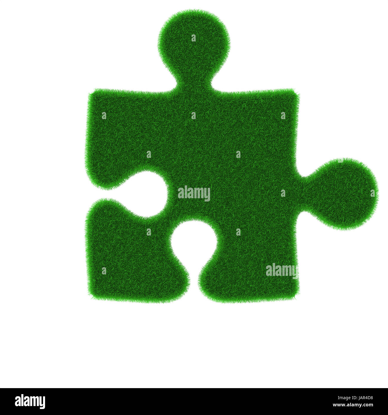 Green puzzle piece made of grass isolated on white background Stock