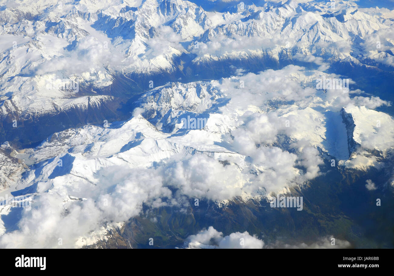 Swiss and French Alps covered in snow - Aerial view Stock Photo - Alamy