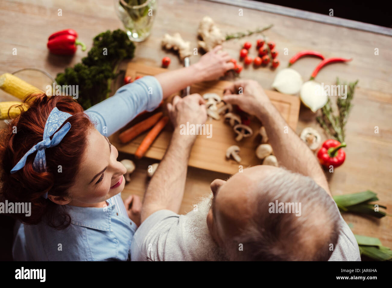 Couple preparing vegan food Stock Photo