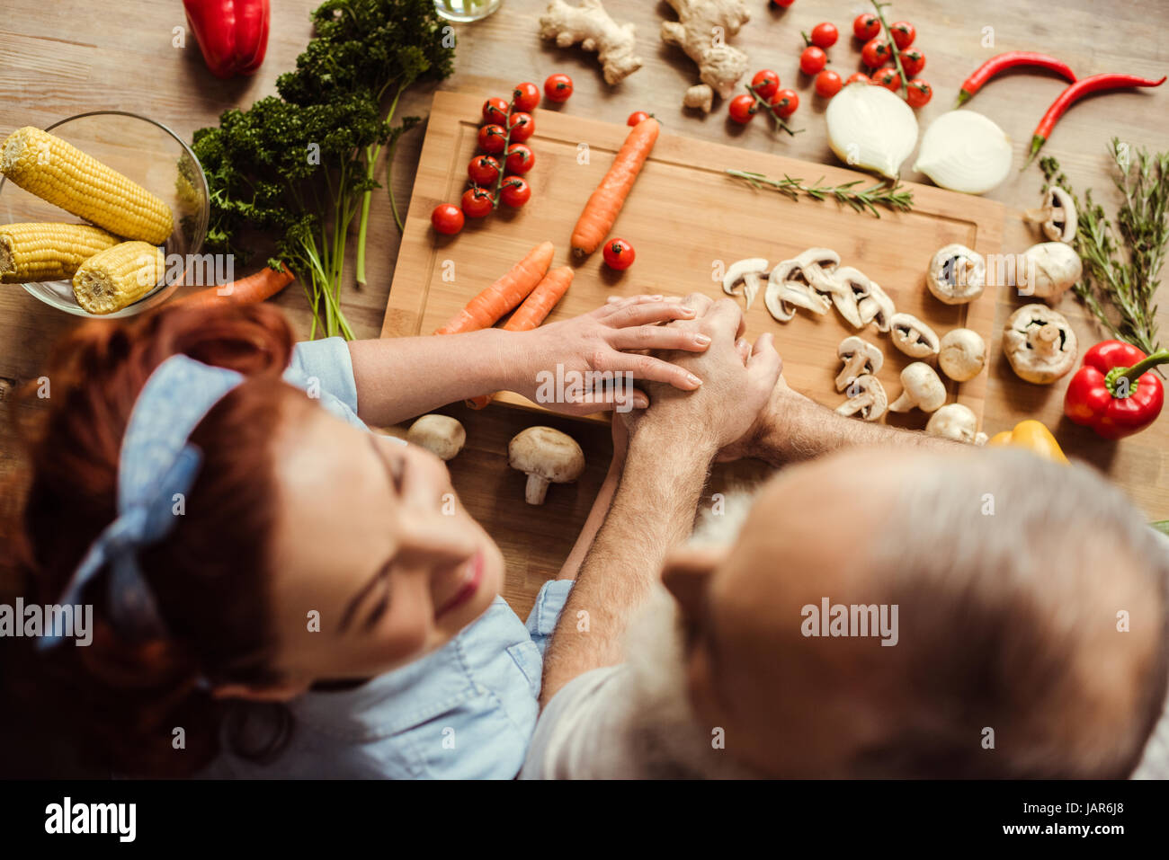 Couple preparing vegan food Stock Photo