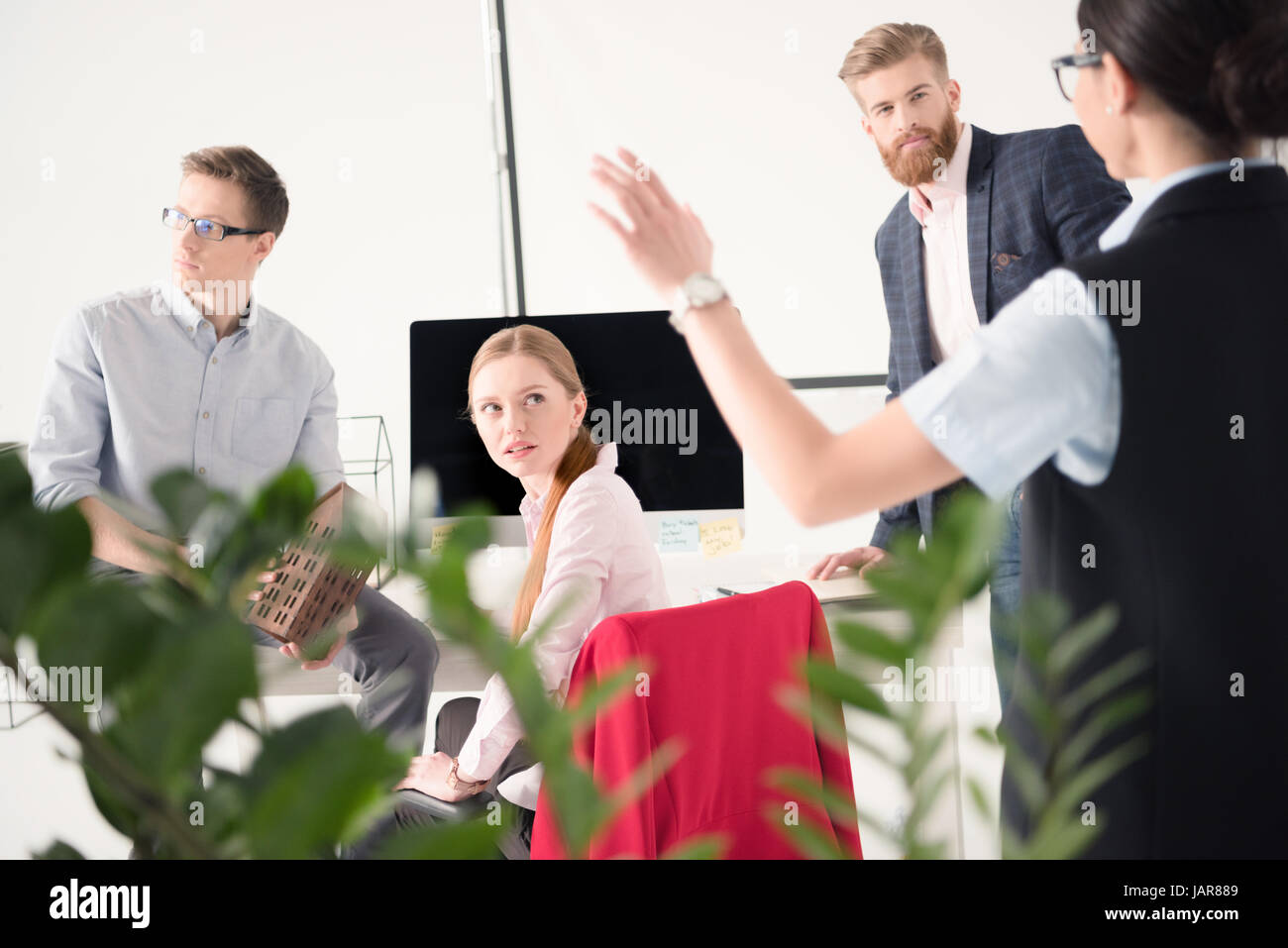 Young businesspeople working together Stock Photo - Alamy