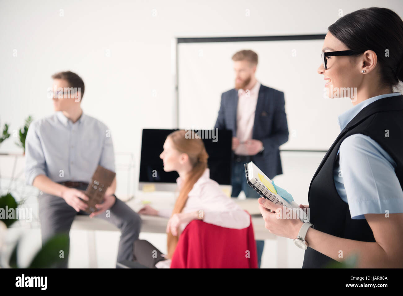 Half length business smiling hi-res stock photography and images - Alamy