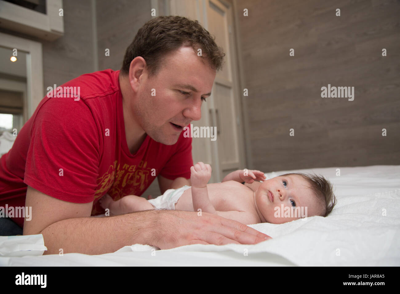 Dad soothing newborn baby Stock Photo