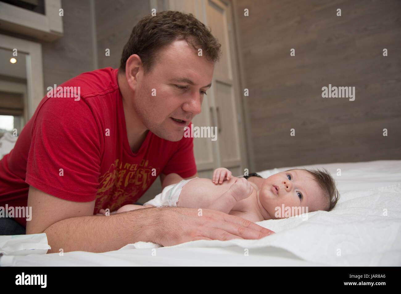 Dad soothing newborn baby Stock Photo