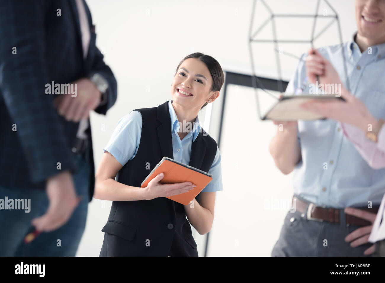 Young businesspeople working together Stock Photo - Alamy