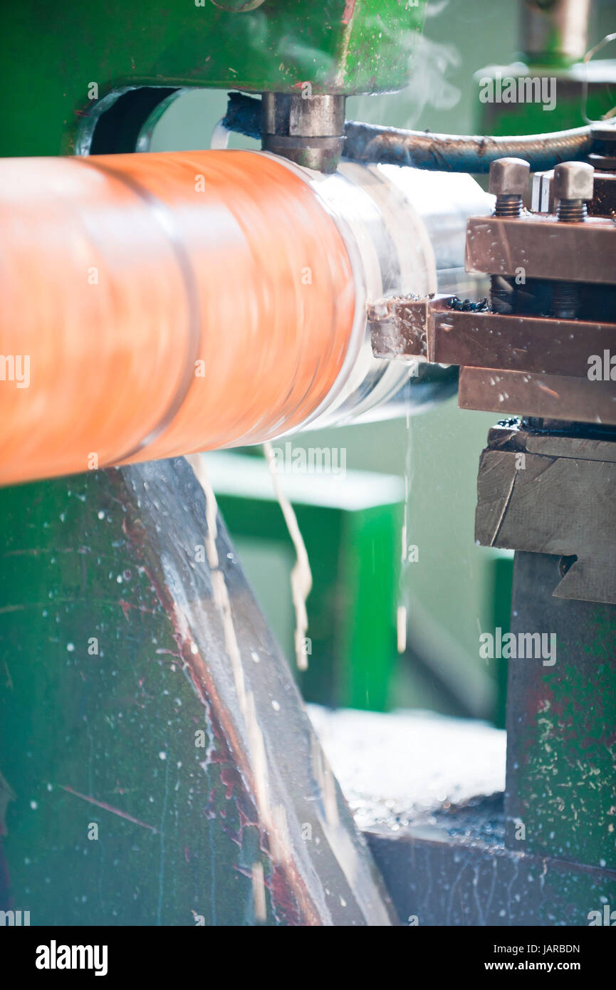 Lathe Turning Stainless Steel. Motion blur and shallow depth of field