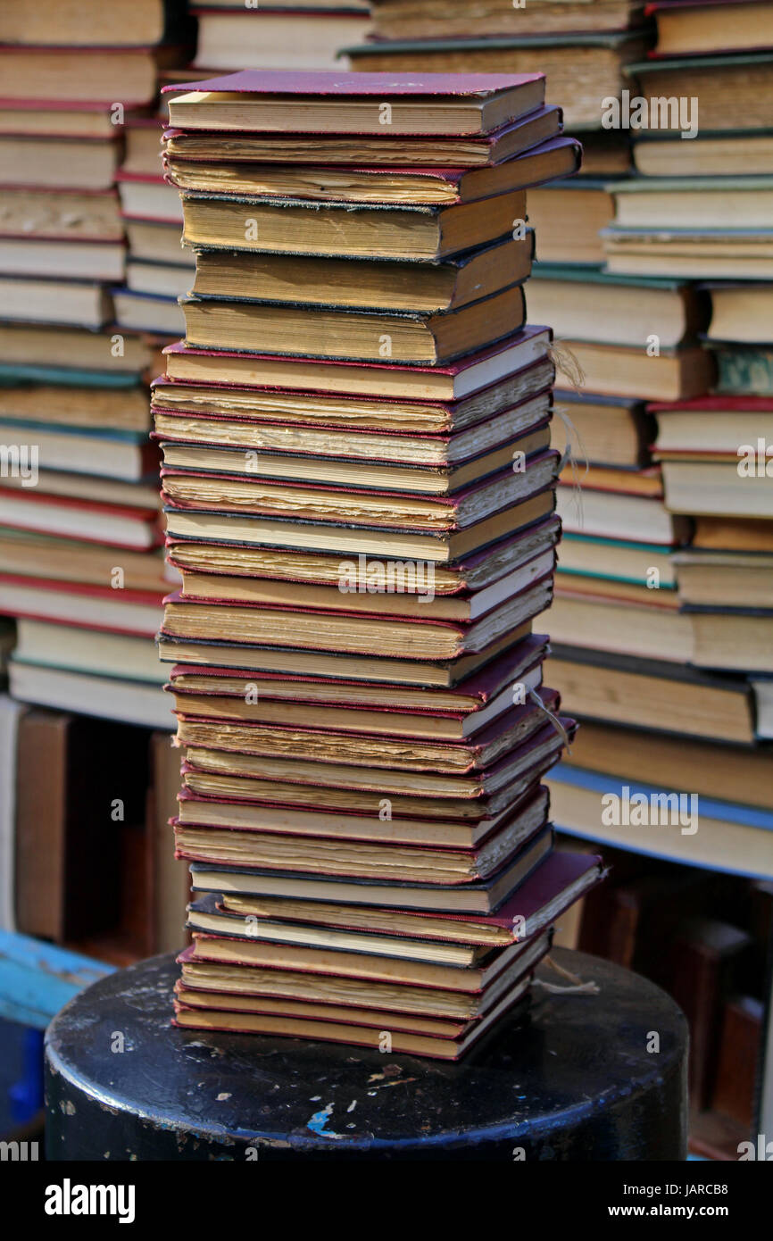 Pile of old used books on antique market Stock Photo Alamy