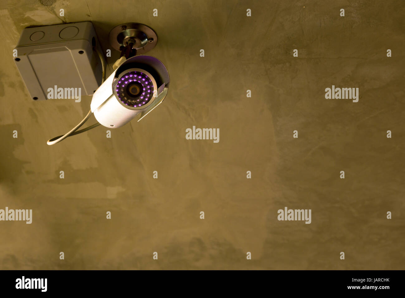 CCTV security camera at night Stock Photo Alamy