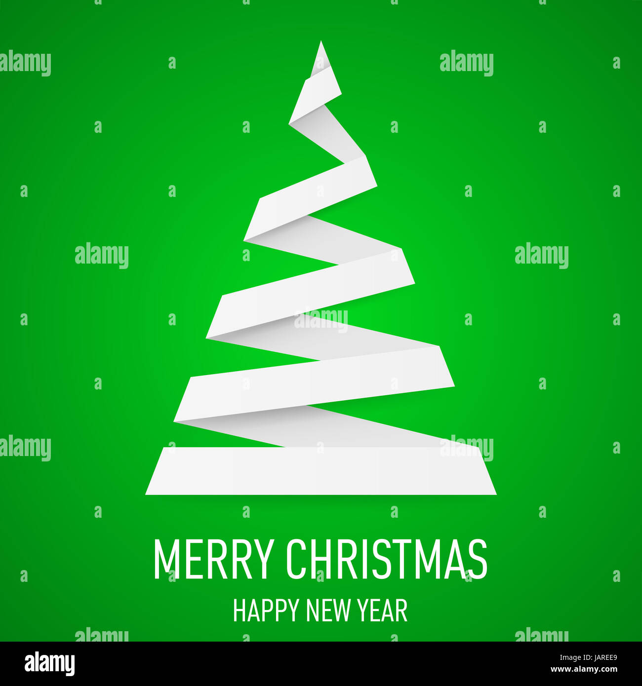 White paper Christmas tree in origami style on green background ...