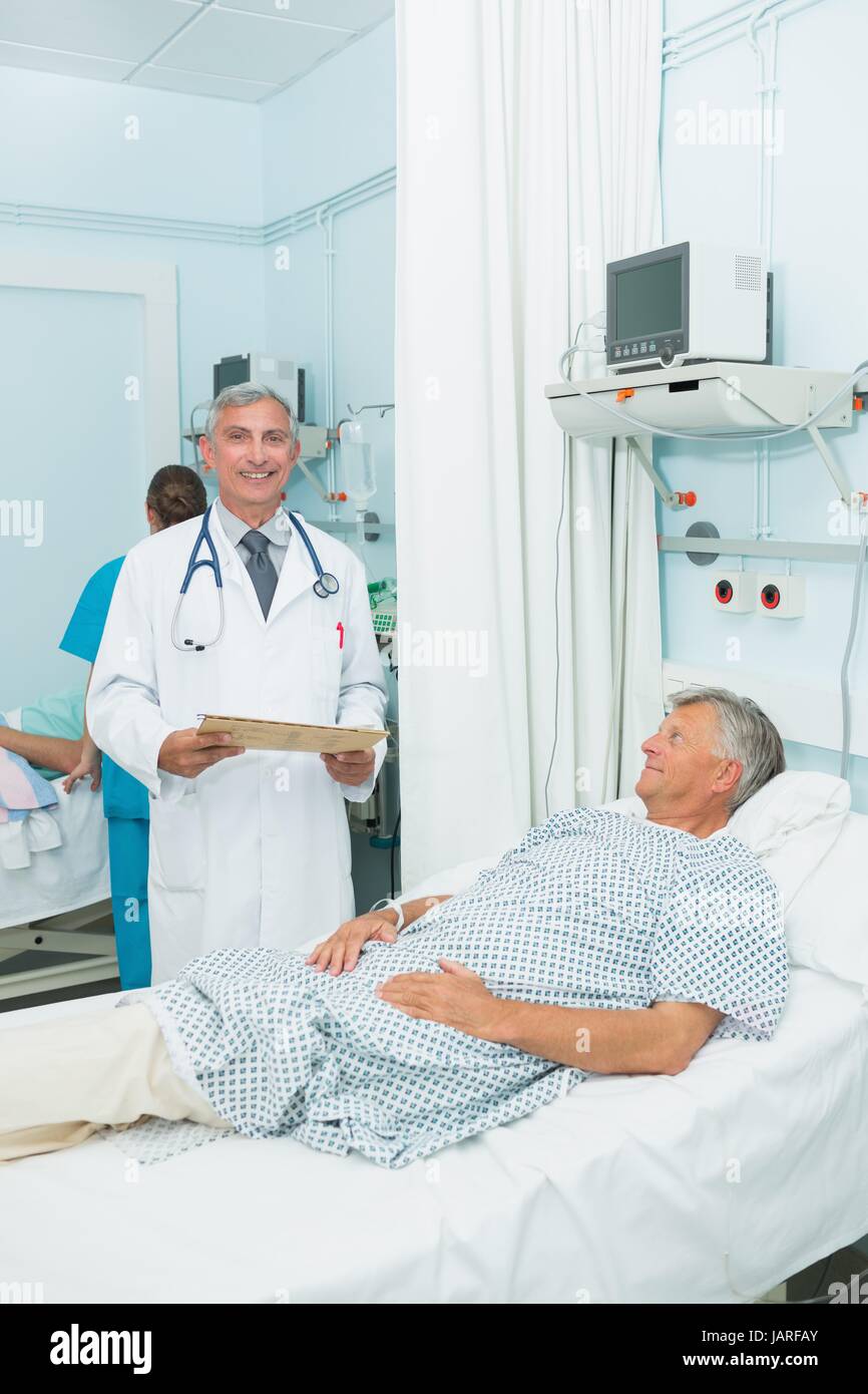 Doctor in ward take hi-res stock photography and images - Alamy