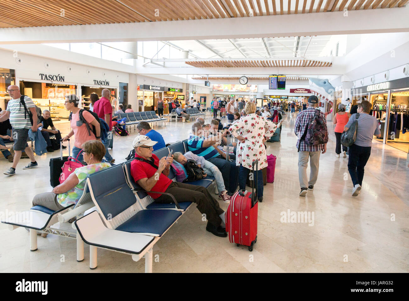 Lanzarote airport passengers waiting in the departure lounge