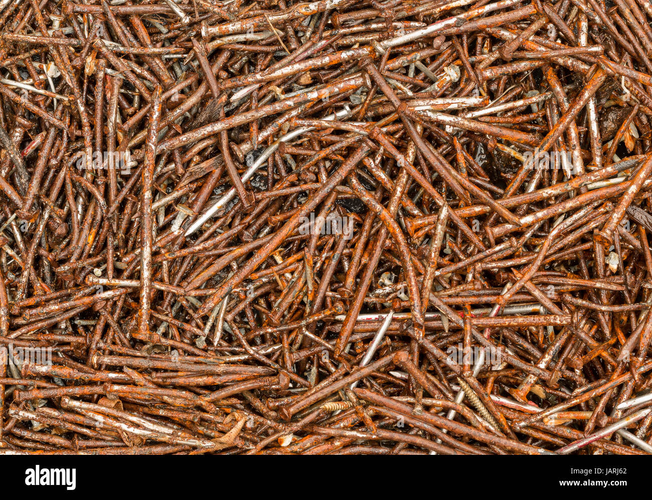 Full frame image of rusted and used nails. Stock Photo