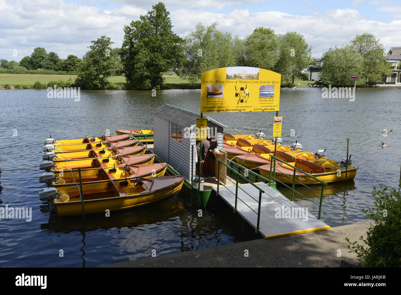 Small boats for self hire on the Thames at Windsor Stock Photo - Alamy