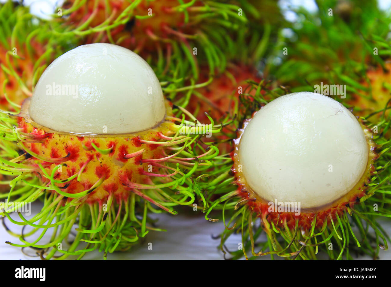 rambutan fruit on white background Stock Photo - Alamy