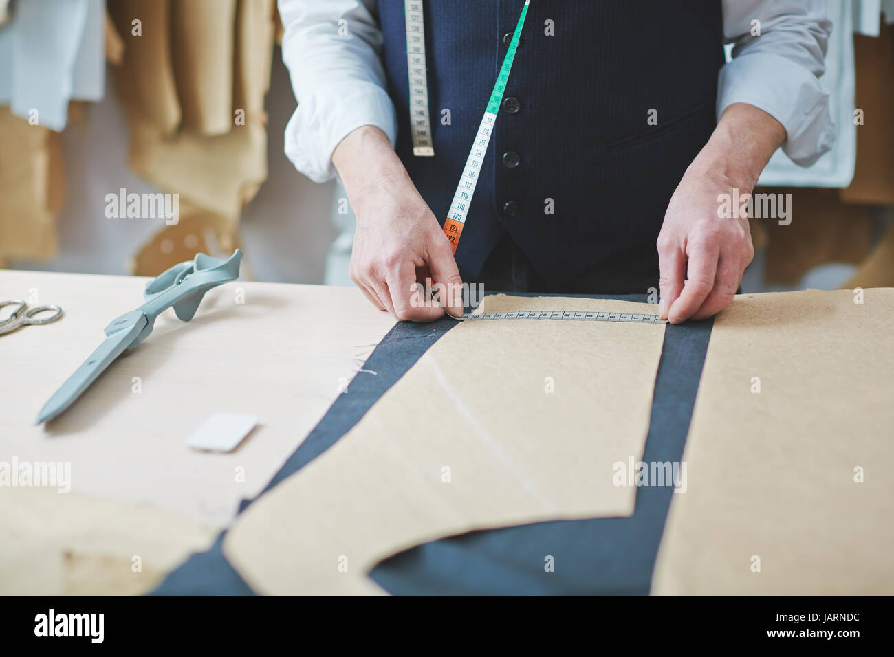 Tailors Working Table in Atelier Stock Photo