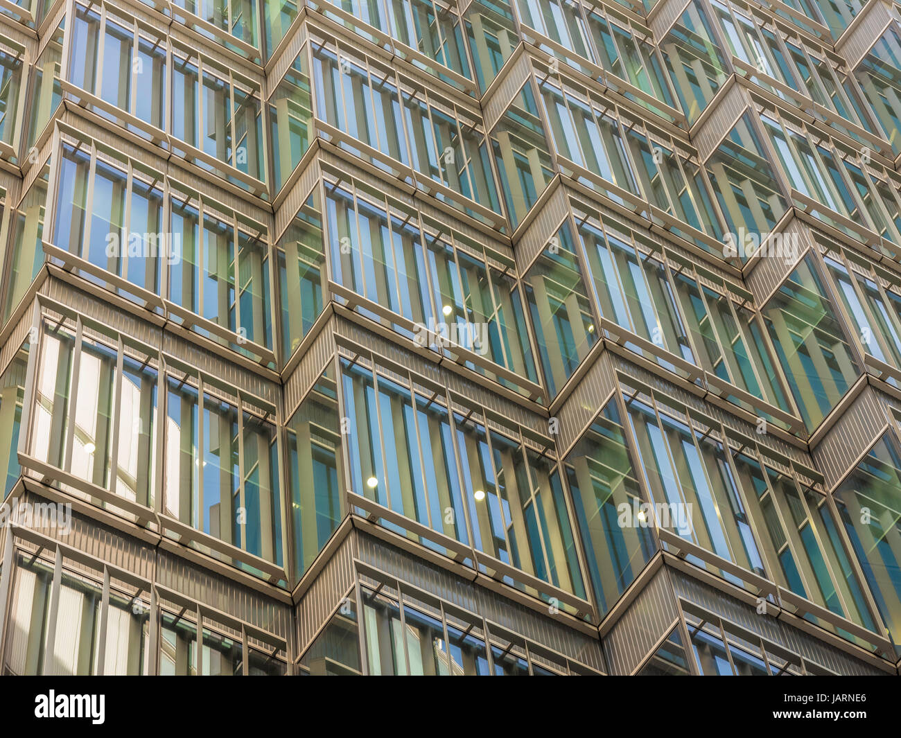 London-UK, April 13th, 2017: London Docklands skyscrapers. Low wide angle view of converging skyscrapers in the business district. Stock Photo