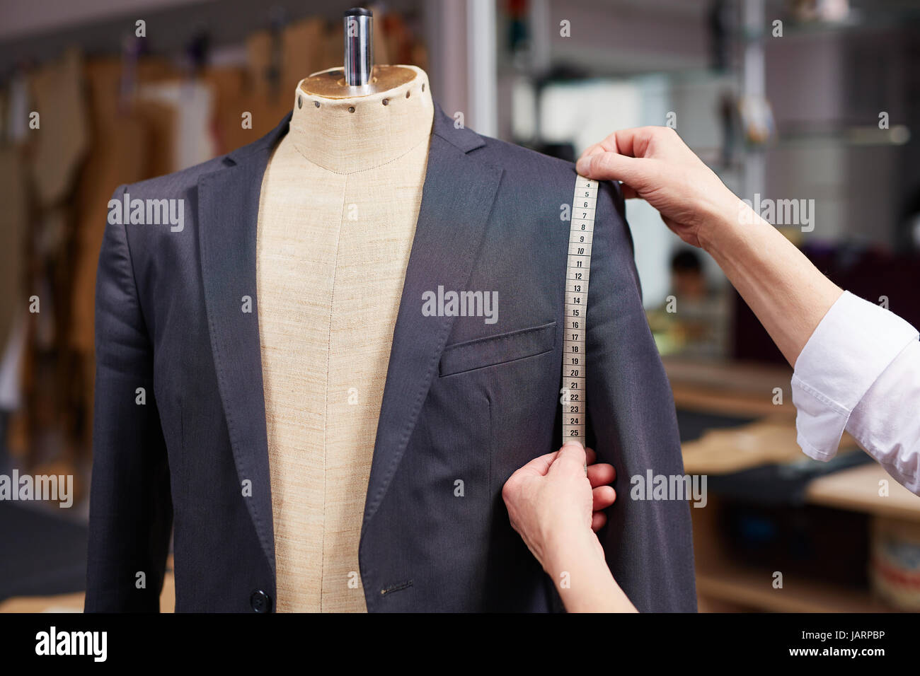 Tailored Suit in Atelier Stock Photo