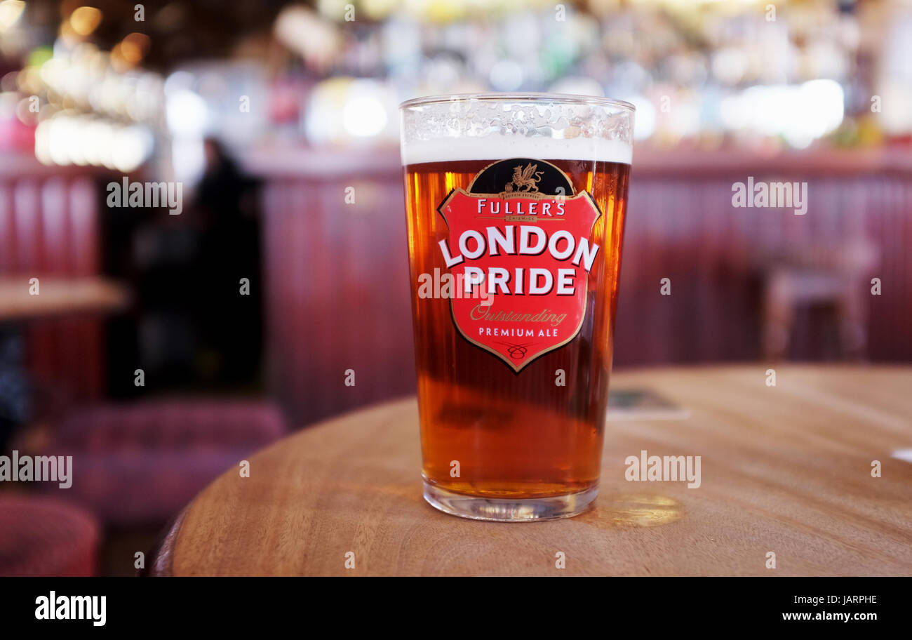 Pint of Fullers London Pride Best Bitter beer in British pub Stock Photo
