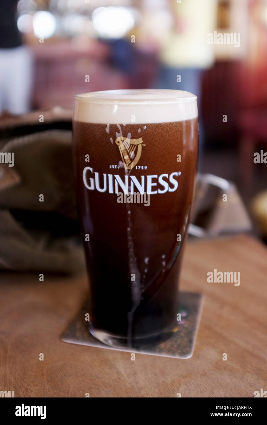 Fresh Pint Of Guinness Ballyneale Ireland Stock Photo - Download