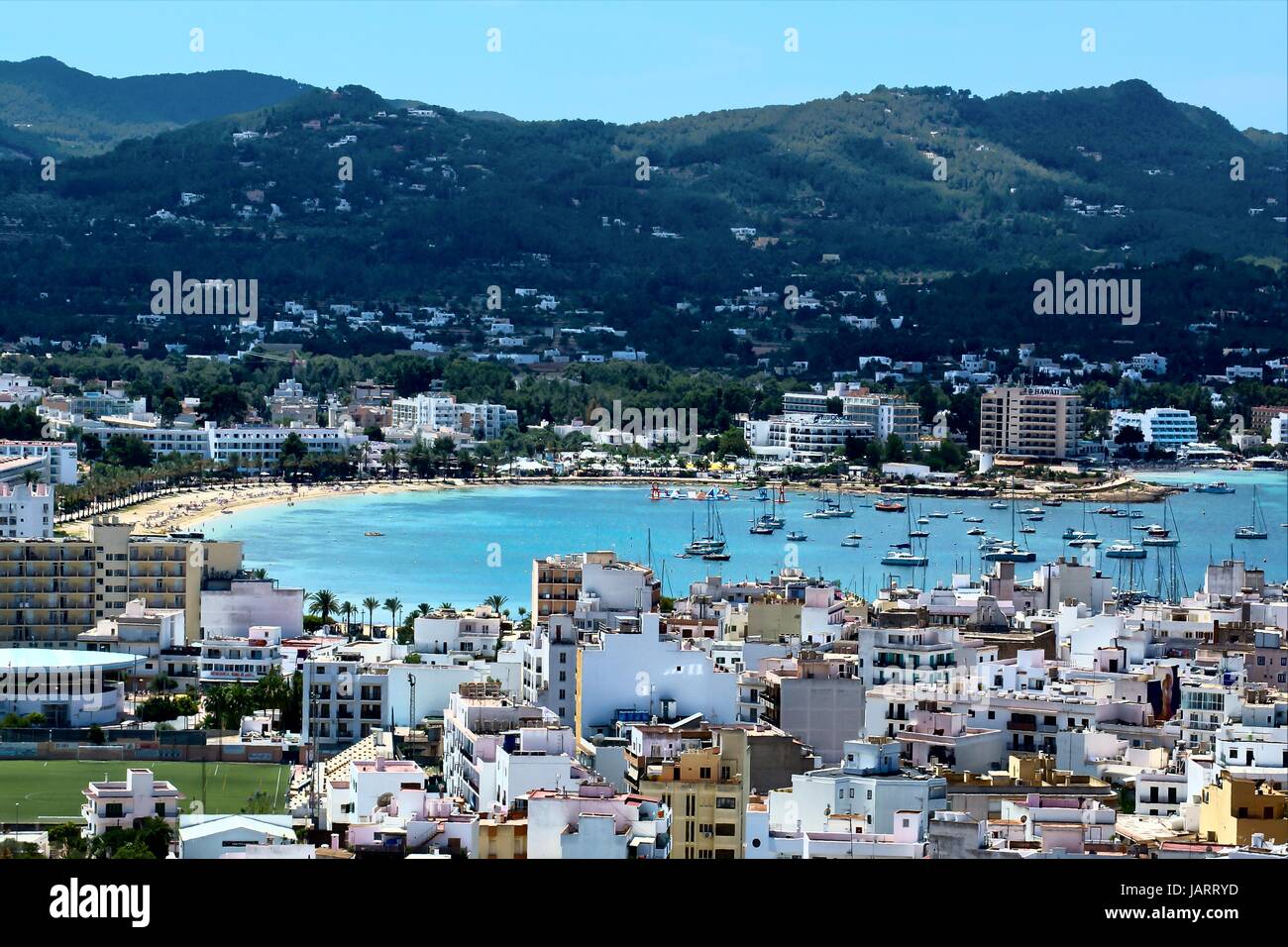 A view of San Antonio Bay also known as Sant Antoni De Portmany from the surrounding mountains. Ibiza, Spain Stock Photo