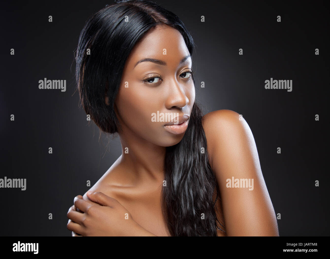 Young beautiful black woman with long hair Stock Photo - Alamy