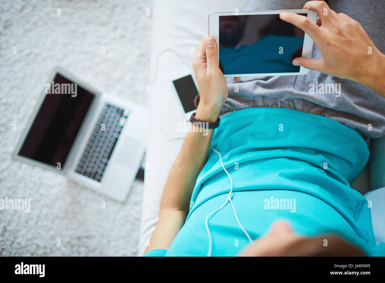 Using modern device Stock Photo - Alamy
