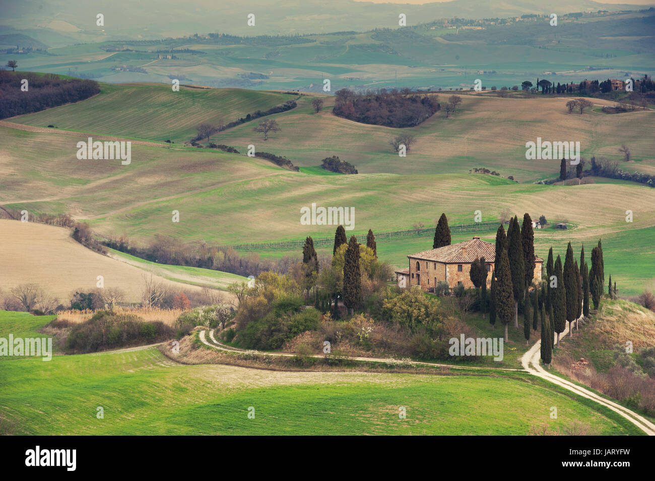 Outdoor Tuscan Farmhouse and hills landscape Stock Photo - Alamy