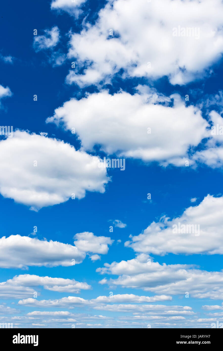 White clouds in blue summer sky background Stock Photo - Alamy