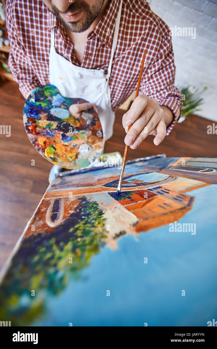 Artist Painting Beautiful Picture on Easel in Studio Stock Photo - Alamy
