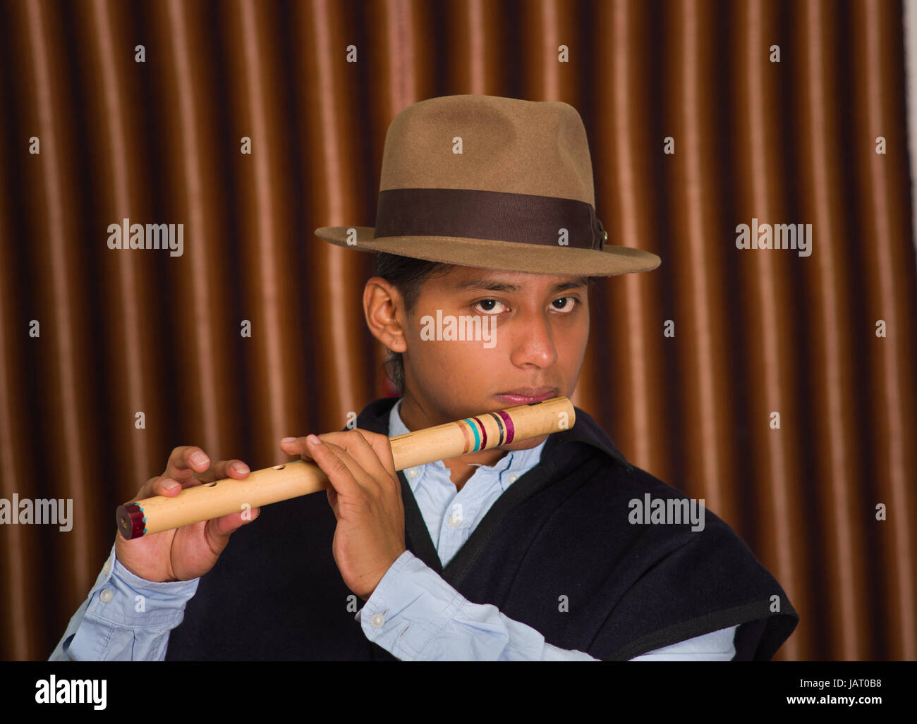 Close up portrait of handsome young indigenous man from Otavalo