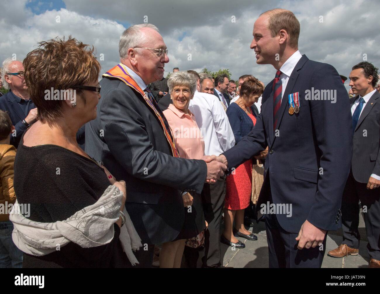 The Duke of Cambridge (right) meets the Grand Secretary of the Orange Order Reverend Mervyn Gibon following a ceremony at the Island of Ireland Peace Park in Messines, Belgium to commemorate Battle of Messines Ridge. Stock Photo