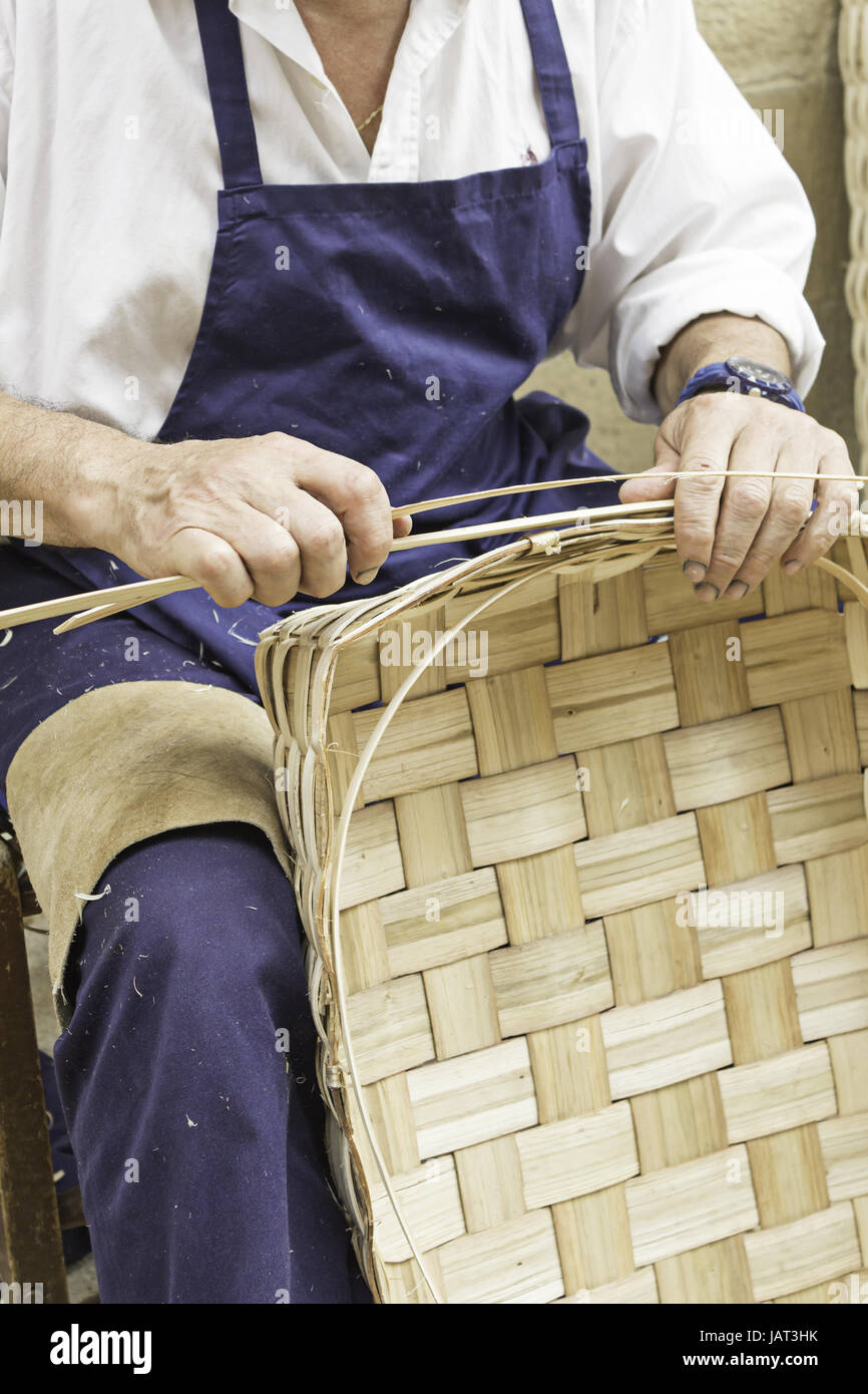Craftsman making baskets with cut wood worker and artist Stock Photo Alamy