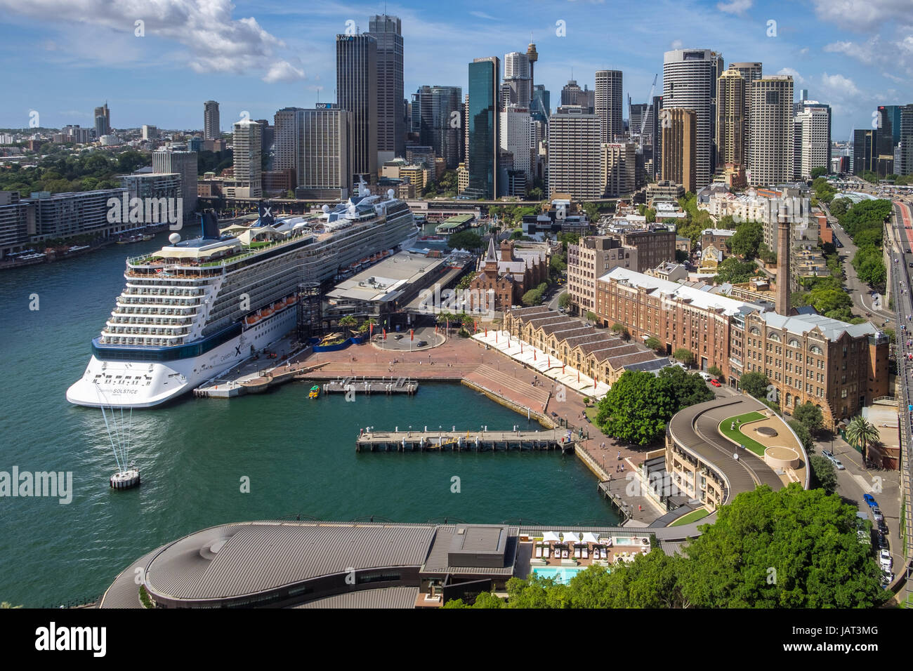A cruise ship in Sydney Harbour with the city in the background Stock Photo