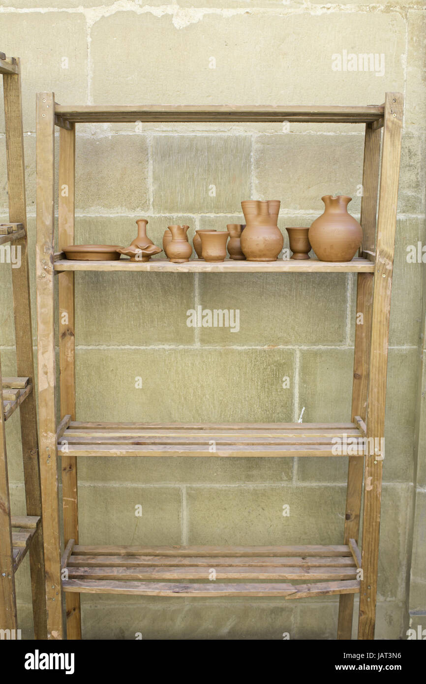 Clay and ceramics vases on shelves in medieval market Stock Photo Alamy