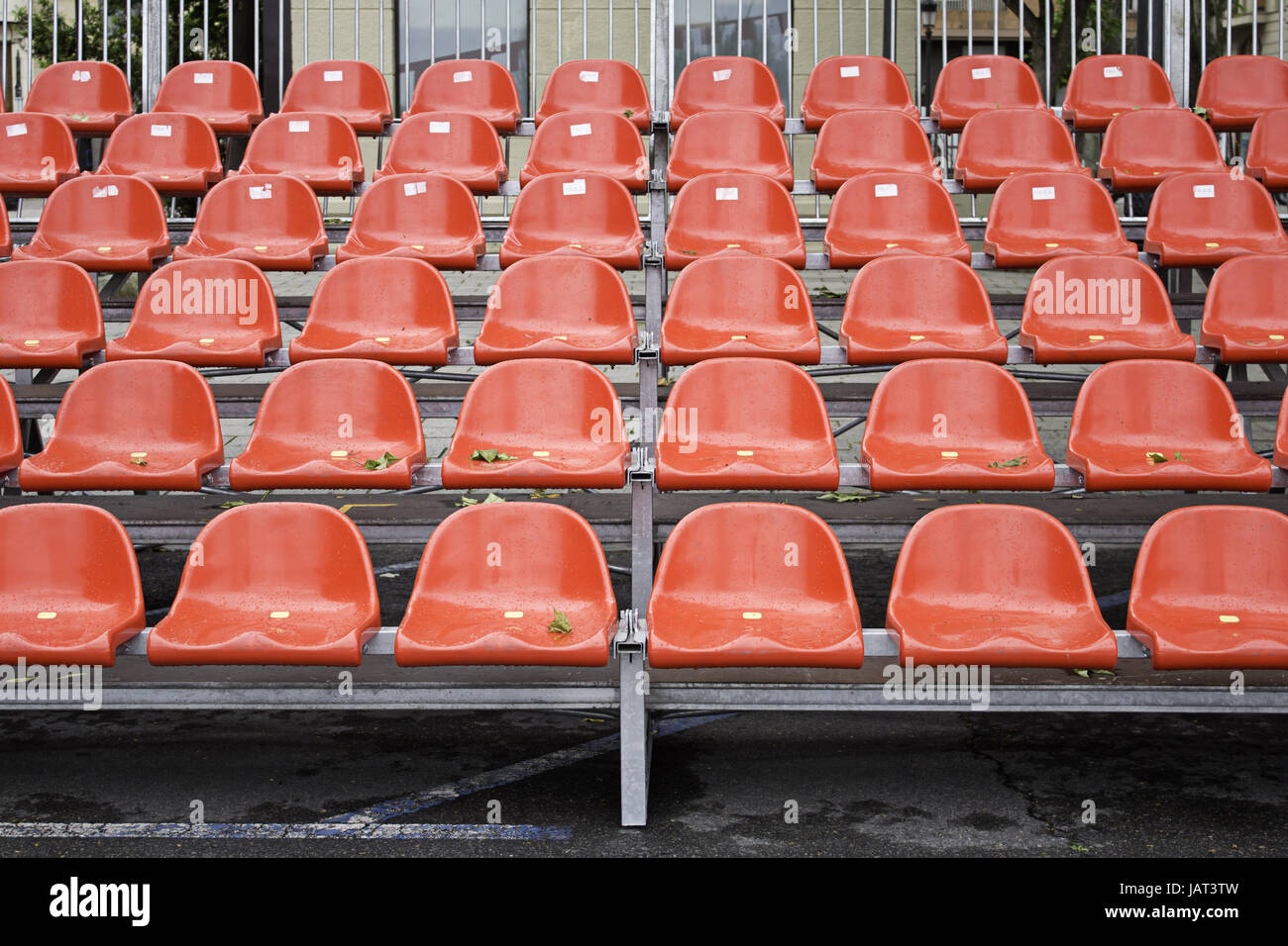 Bright red bleacher seats in event, construction and celebration Stock