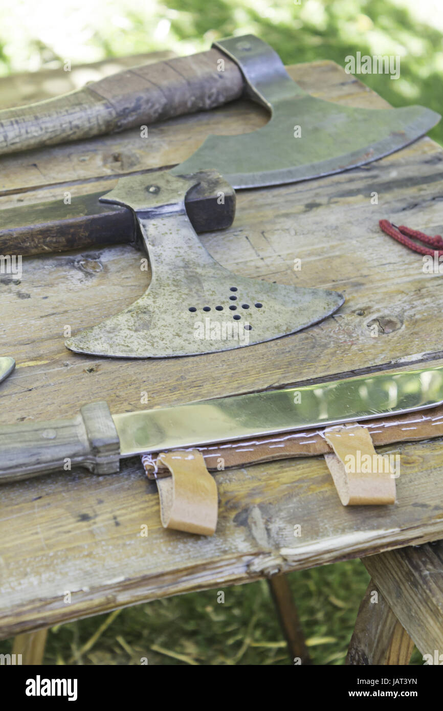 Steel axes and swords medieval warfare and celebration Stock Photo Alamy