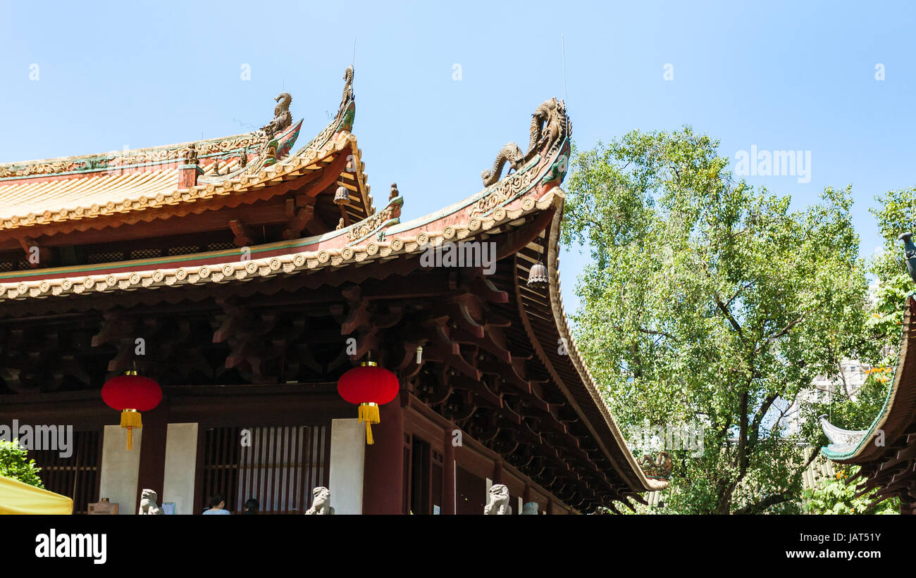 GUANGZHOU, CHINA - APRIL 1, 2017: decorated roof of Guangxiao Temple (Bright Obedience, Bright Filial Piety Temple). This is is one of the oldest Budd Stock Photo